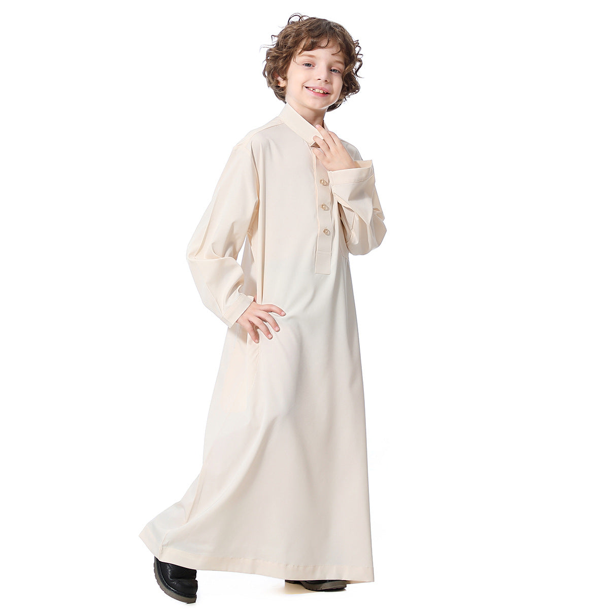 Middle Eastern teenage boy robe